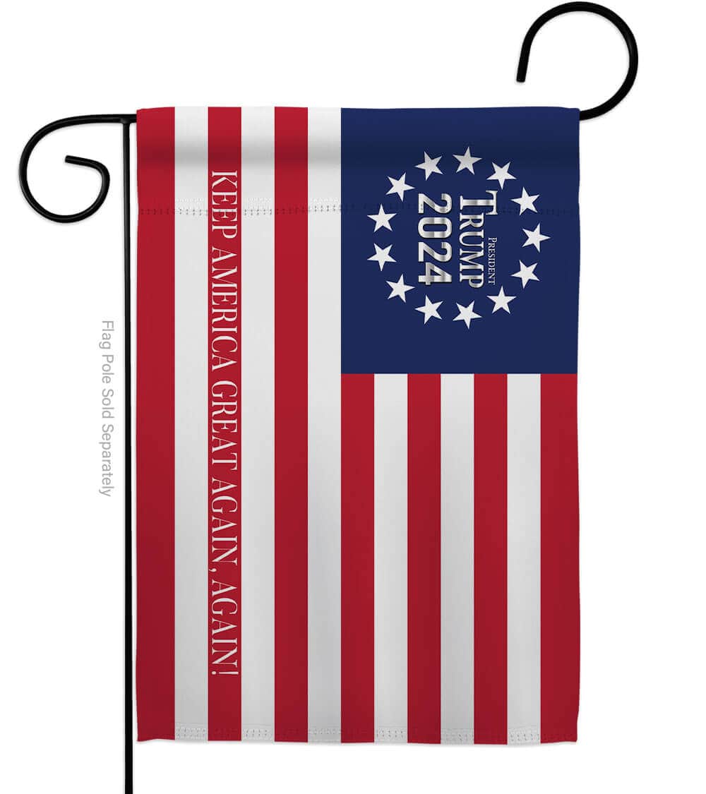 Trump 2024 Betsy Ross USA garden flag displayed outdoors, showcasing a double-sided design with vibrant colors in a garden setting.