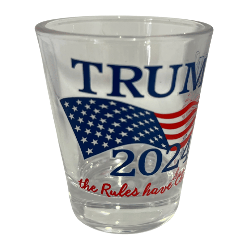 Trump 2024 Rules Have Changed shot glass featuring red, white, and blue design with large navy lettering and an American flag graphic.