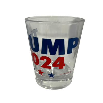 Trump 2024 shot glass featuring bold navy lettering and stars in red and blue, ideal for patriotic supporters.