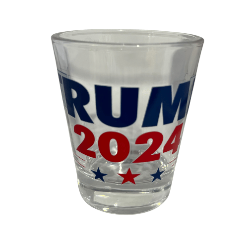 Trump 2024 shot glass featuring bold navy lettering and stars in red and blue, ideal for patriotic supporters.