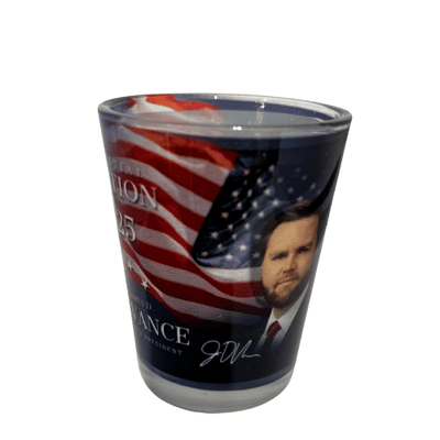 Trump 2025 Inauguration Shot Glass made of crystal-clear glass featuring U.S. Capitol and American flag backdrop with images of Trump and Vance.