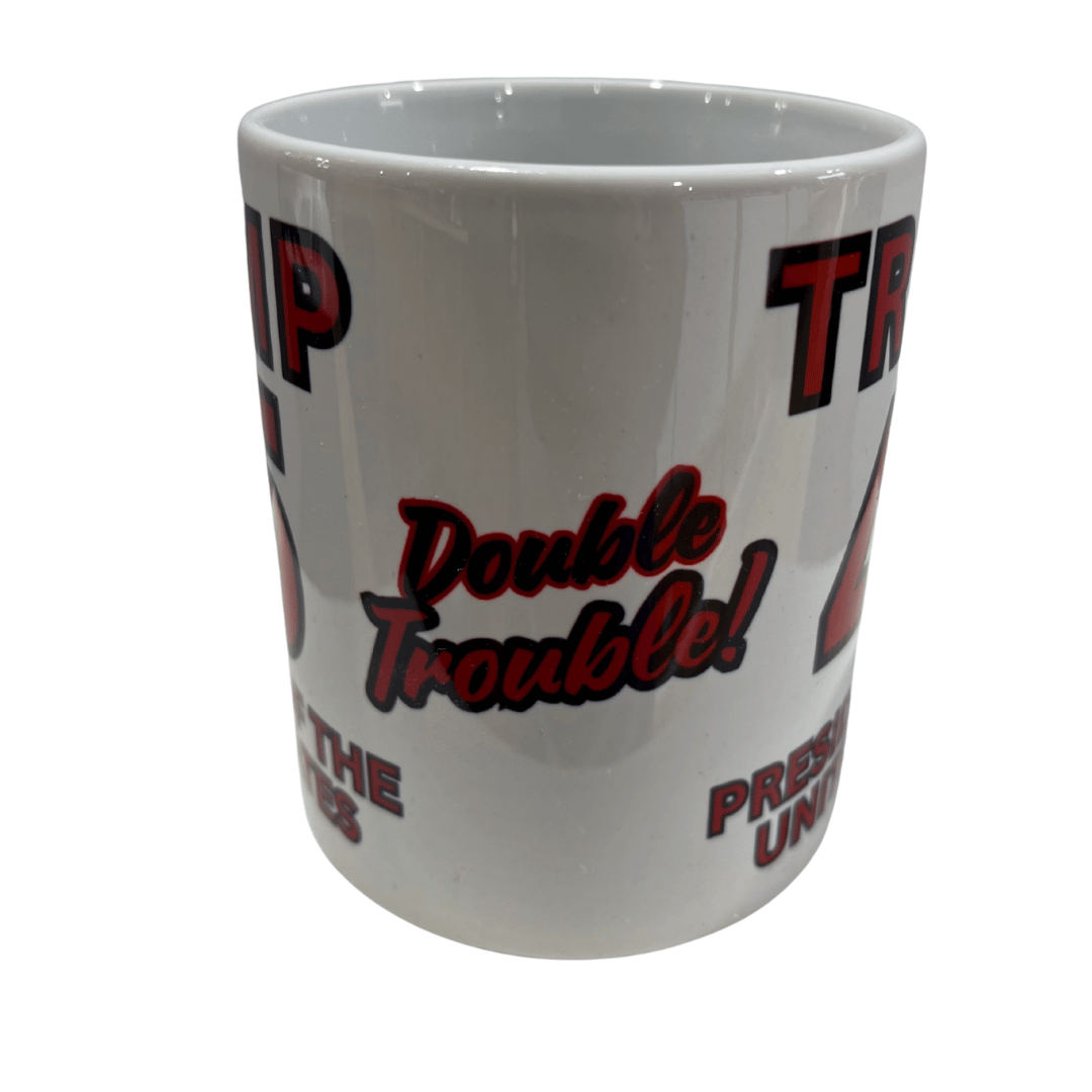 Trump 45/47 Double Trouble Mug featuring bold red and black lettering and a full-wrap design celebrating Trump's presidency.