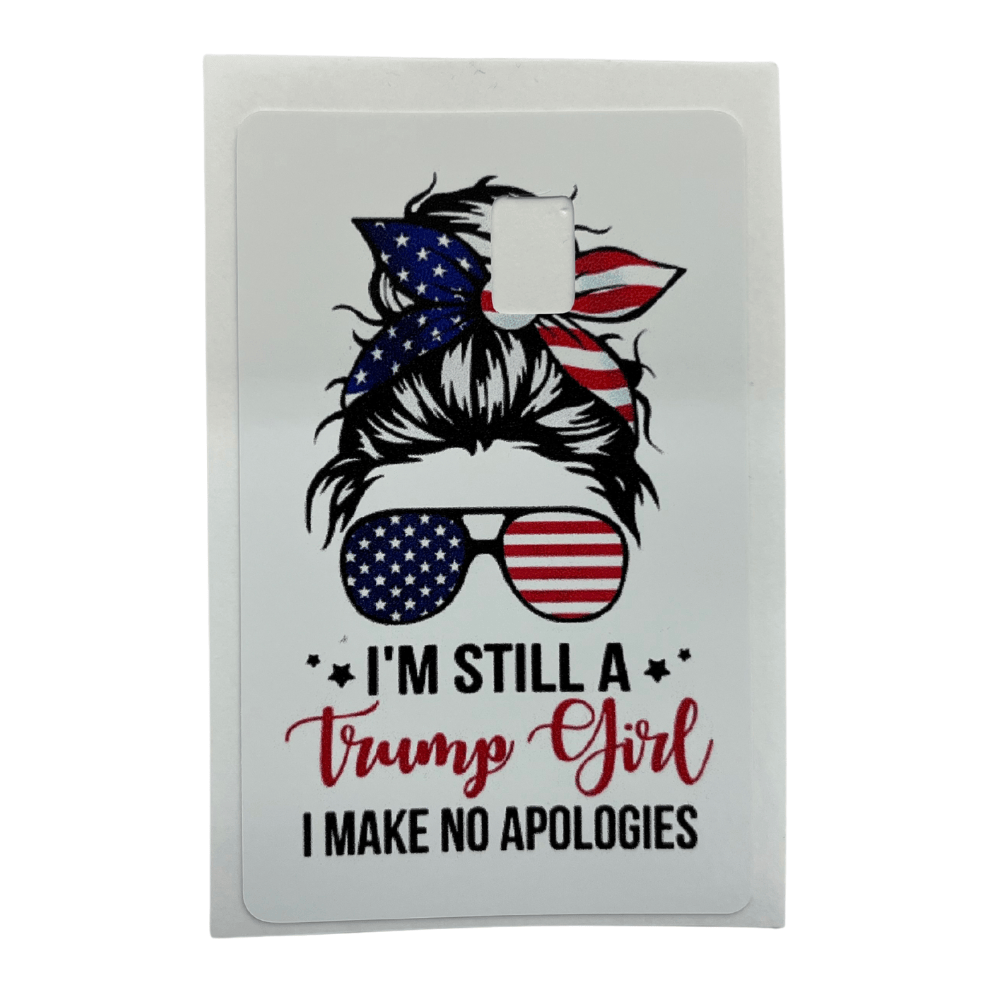 Trump Girl No Apologies Credit Card Cover featuring a messy bun, USA-flag bandana, and bold slogan, displayed with a credit card for reference.