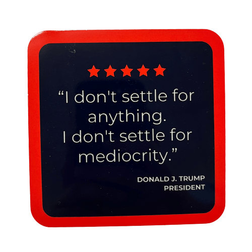 Trump No Mediocrity Quote Coaster, 4x4 square with dark navy background, bold typography, and presidential red stars, displayed on a wood table.