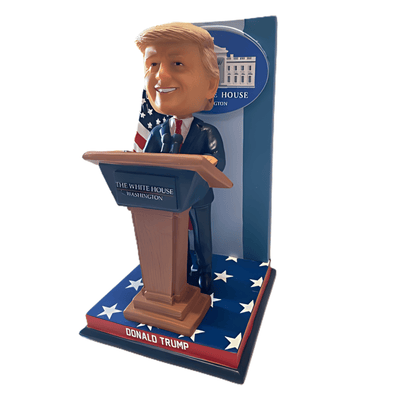 Trump White House Press Conference Bobblehead featuring Donald Trump mid-speech behind a replica podium with microphones and the White House emblem.