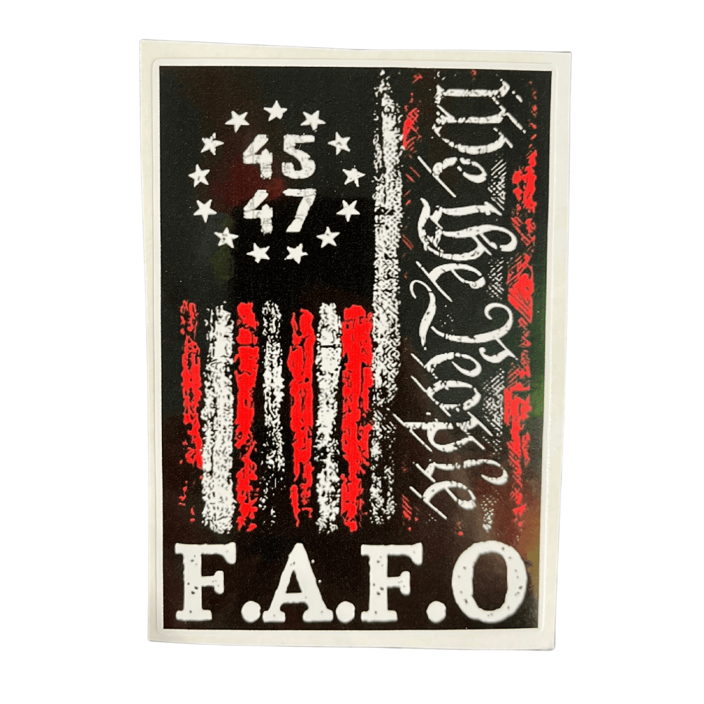 We The People FAFO sticker featuring bold patriotic design displayed on a laptop in an outdoor setting, showcasing its vibrant colors.