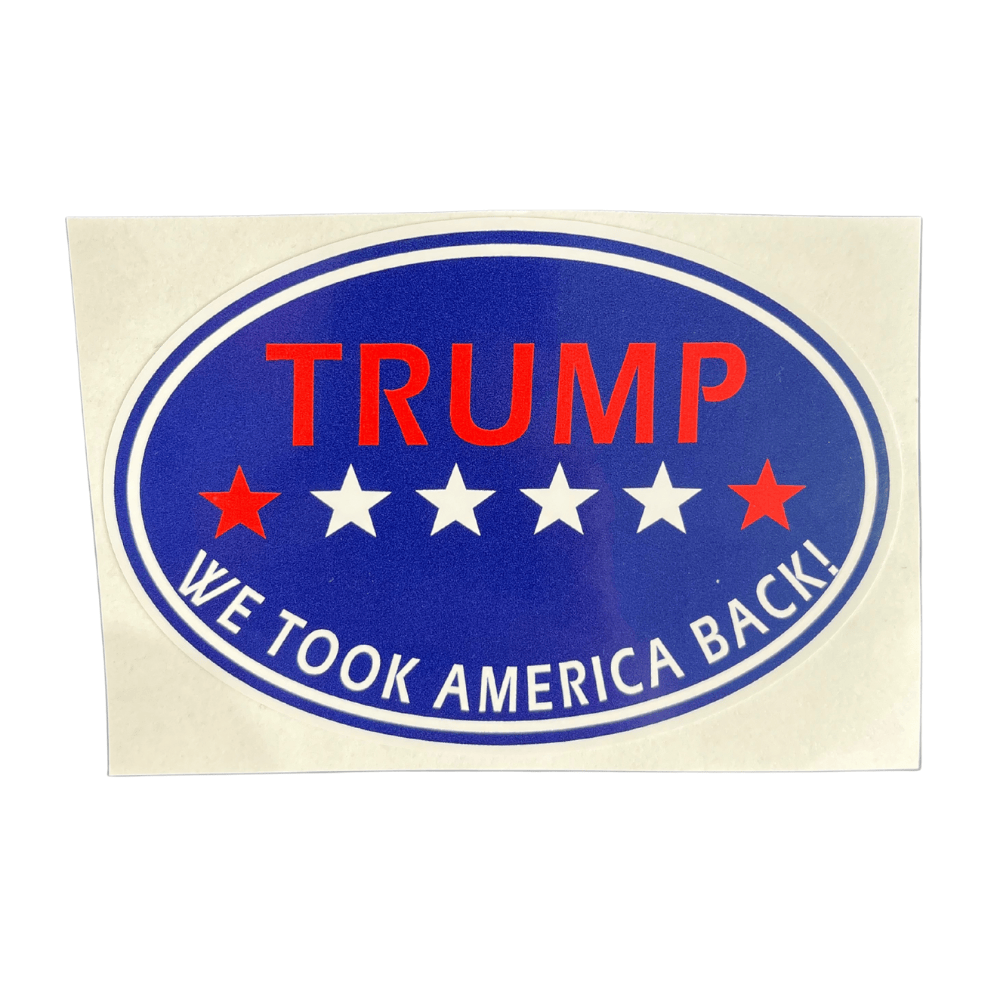 We Took America oval sticker featuring bold American themes displayed on a laptop and car window in an outdoor setting.