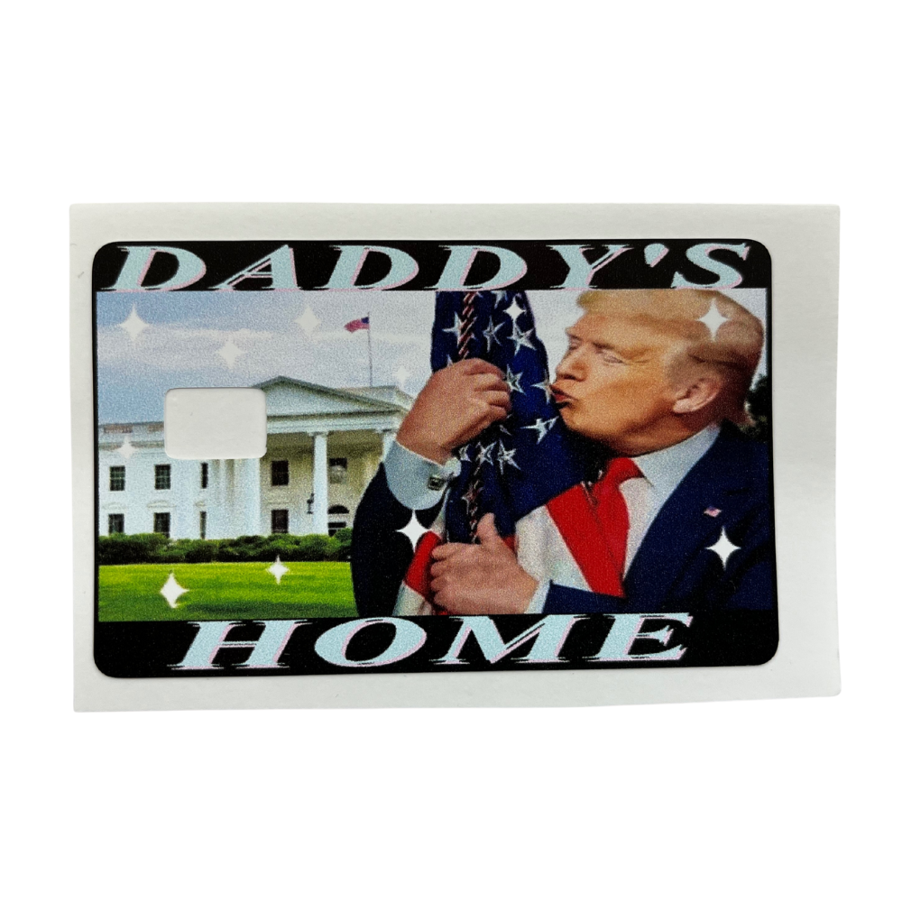 Vinyl credit card cover featuring a “Daddy’s Home” flag-hug design with a chip cut-out.