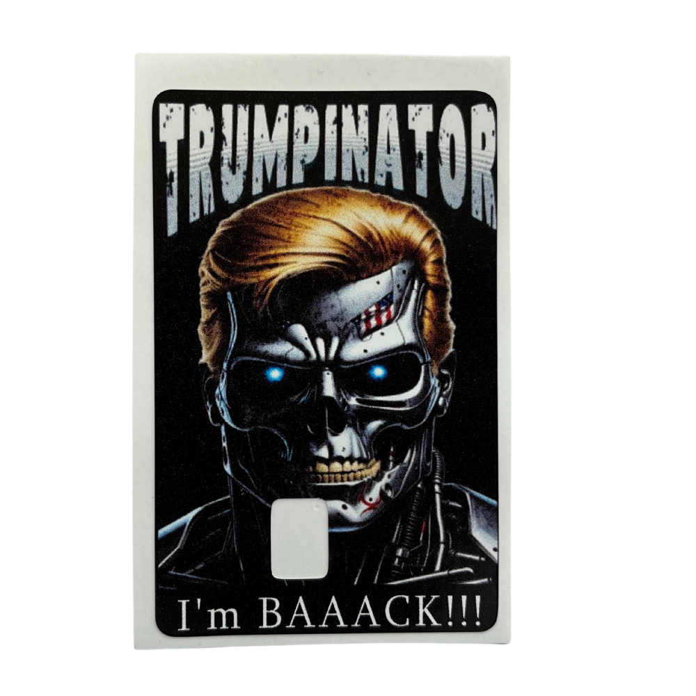 Vinyl credit card cover featuring a cyborg-style Trumpinator design with glowing blue eyes and “I’m BAAACK!!!” text, plus a chip cut-out.