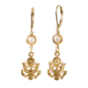 Gold-dipped drop earrings featuring a Great Seal eagle pendant and a hanging faux pearl — a heritage-inspired accessory that pairs patriotic symbolism with elegant simplicity.