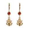Gold-dipped earrings featuring the Great Seal eagle and a red crystal drop — a heritage-inspired, everyday-ready accessory blending patriotic symbolism with refined style.