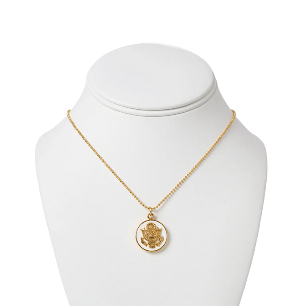 Gold-dipped pendant necklace inspired by the Great Seal of the United States — a symbolic, heritage-themed accessory blending polished style with patriotic significance.