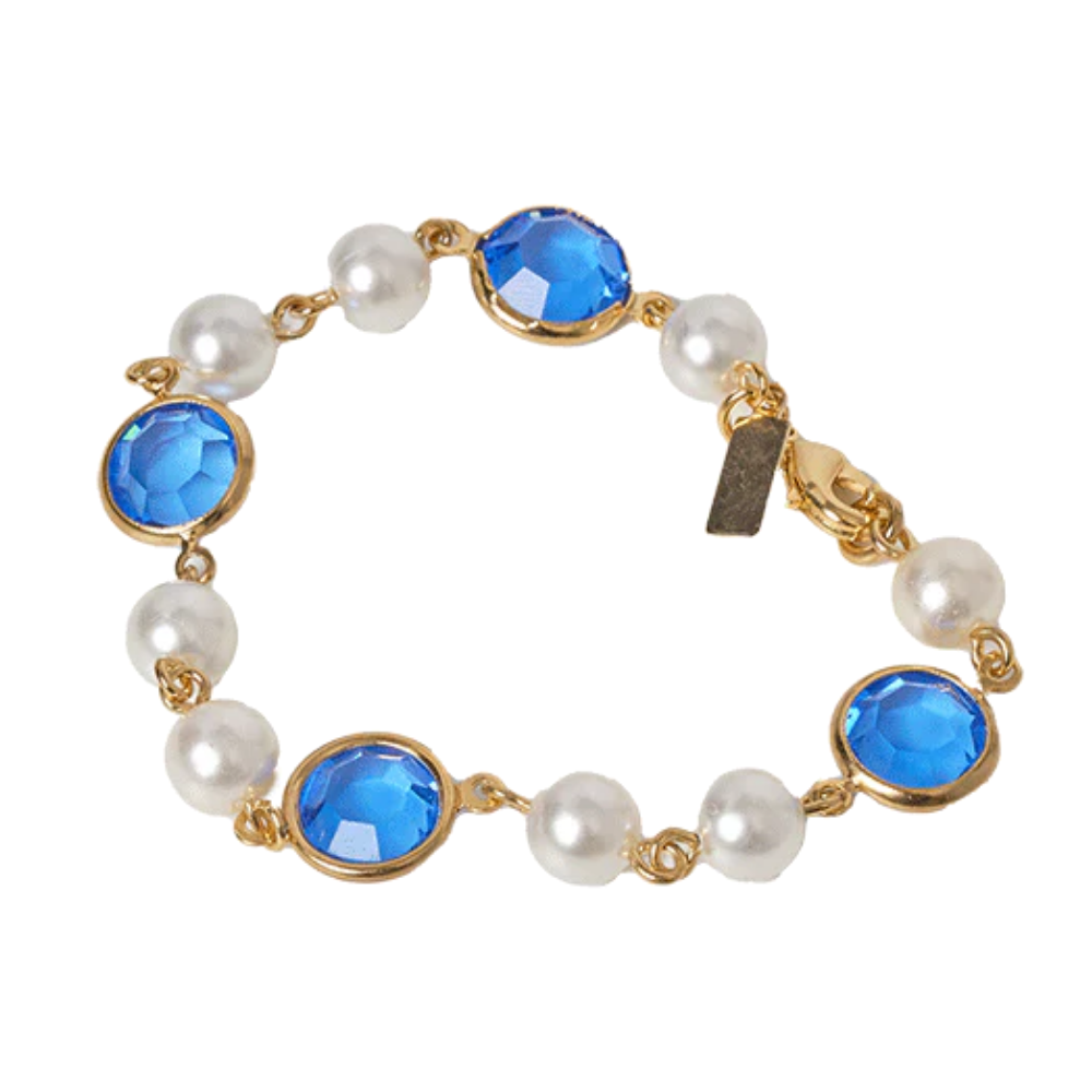 A fashion-pearl bracelet with gold-tone spacers, inspired by Jacqueline Kennedy and the White House Blue Room — elegant, versatile, and comfortably designed.